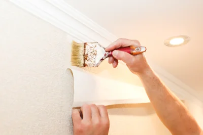 Pose de papier peint à Goux — revêtements muraux et toiles de verre